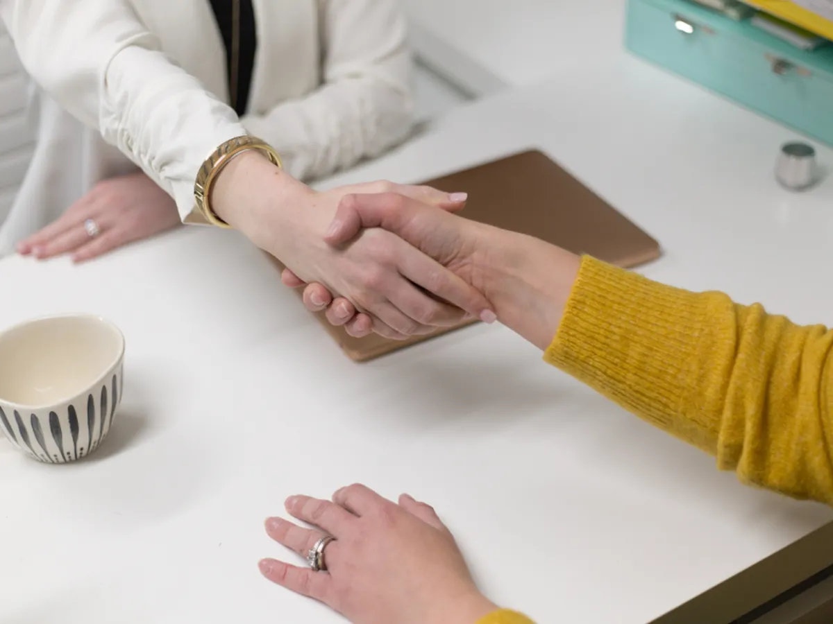 Handshake closing a hiring agreement with Dworo.io