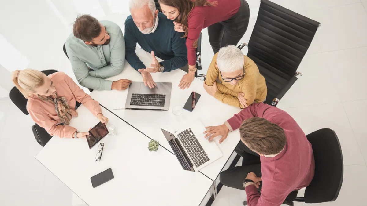 Team planning workforce needs together, workforce planning guide by Dworo.io